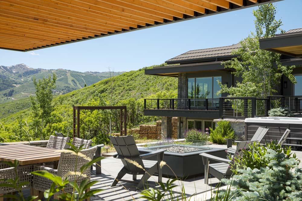 luxury home building in park city: modern cabin style outdoor patio done by sherman homes